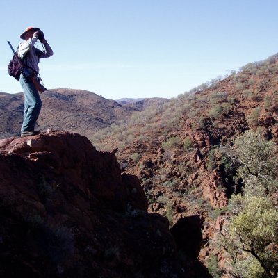 Photo of hunter in rugged Australian outback